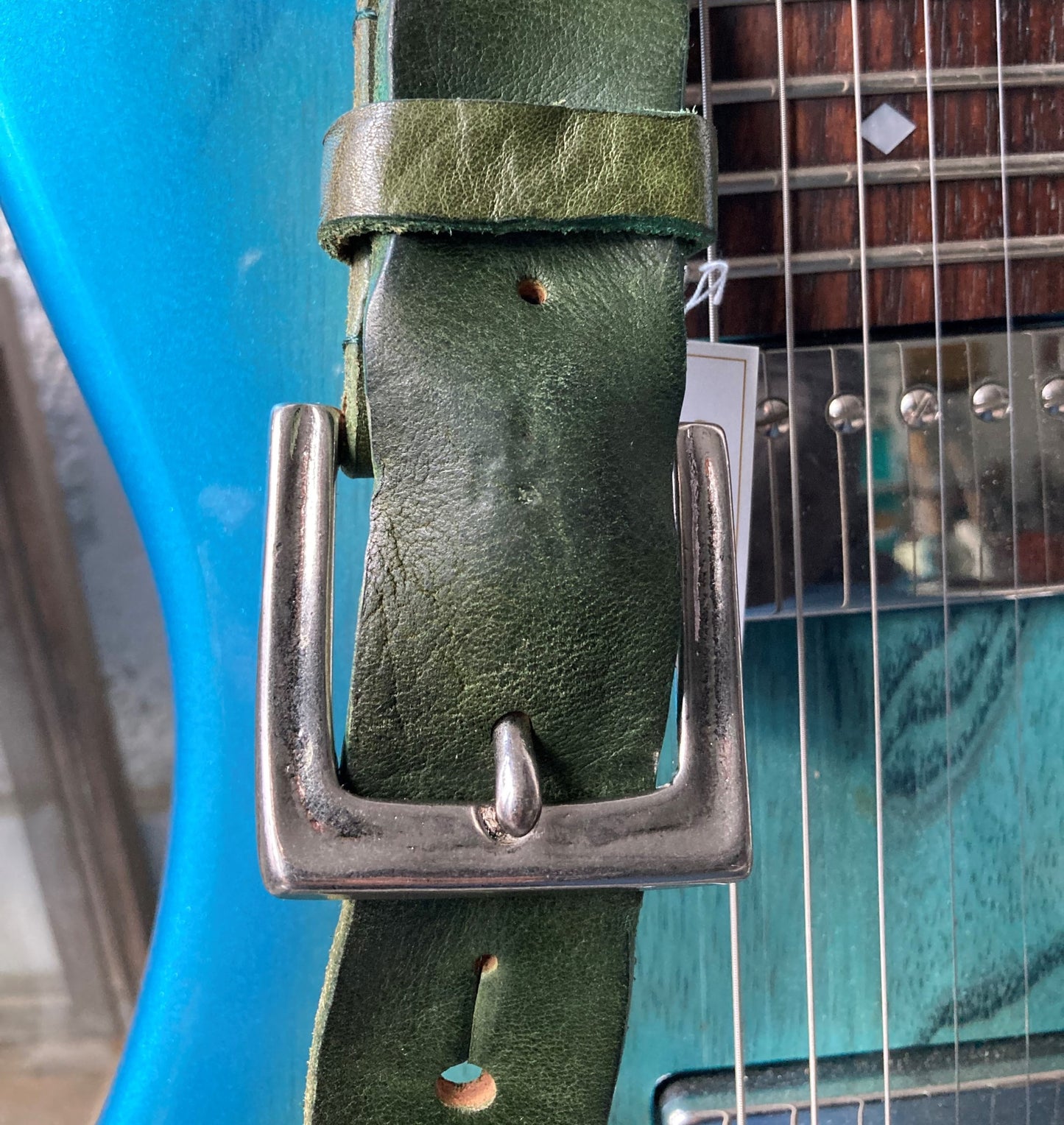KAMINARI Studded Leather Strap Green on guitar