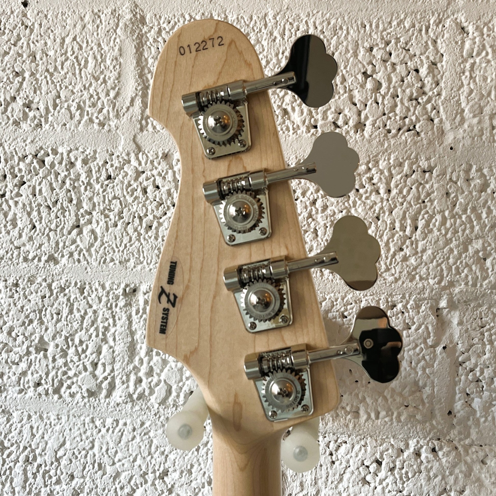 atelier z m245 natural hand-built japanese 4-string active bass headstock back view