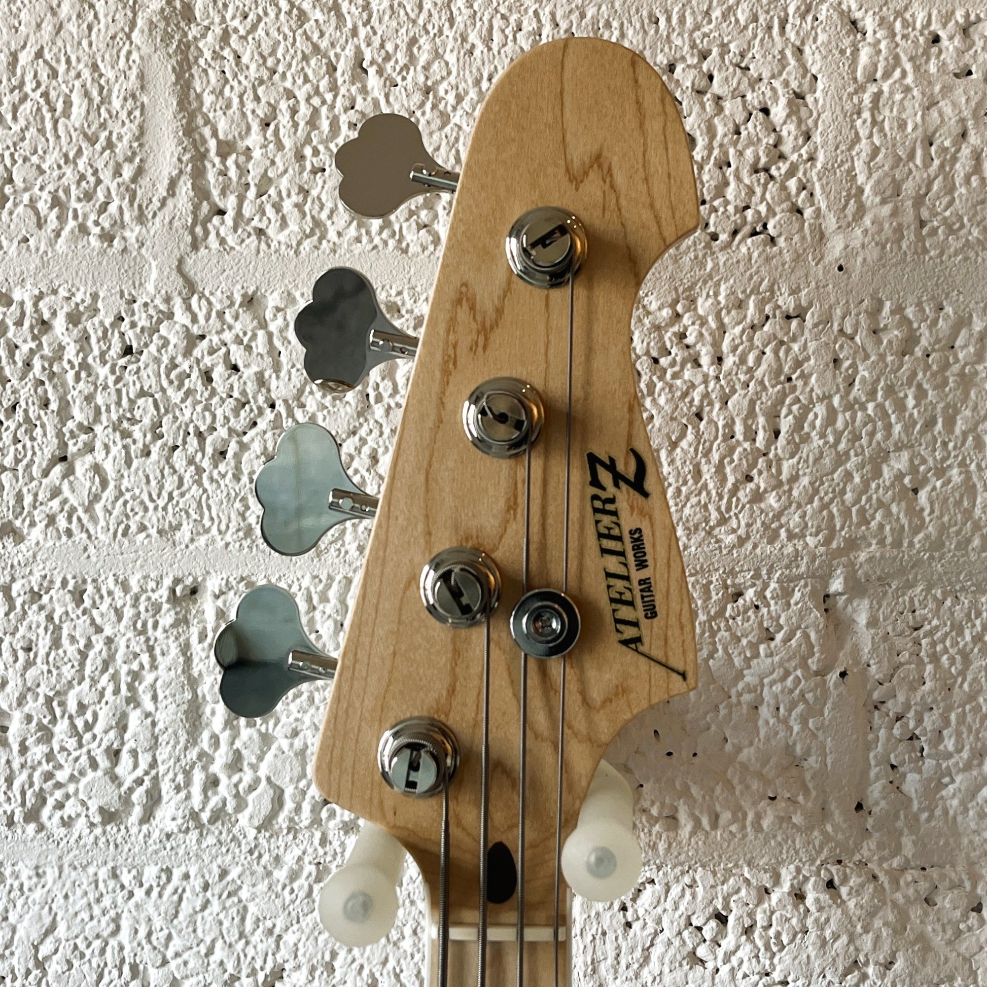 atelier z m245 natural hand-built japanese 4-string active bass headstock