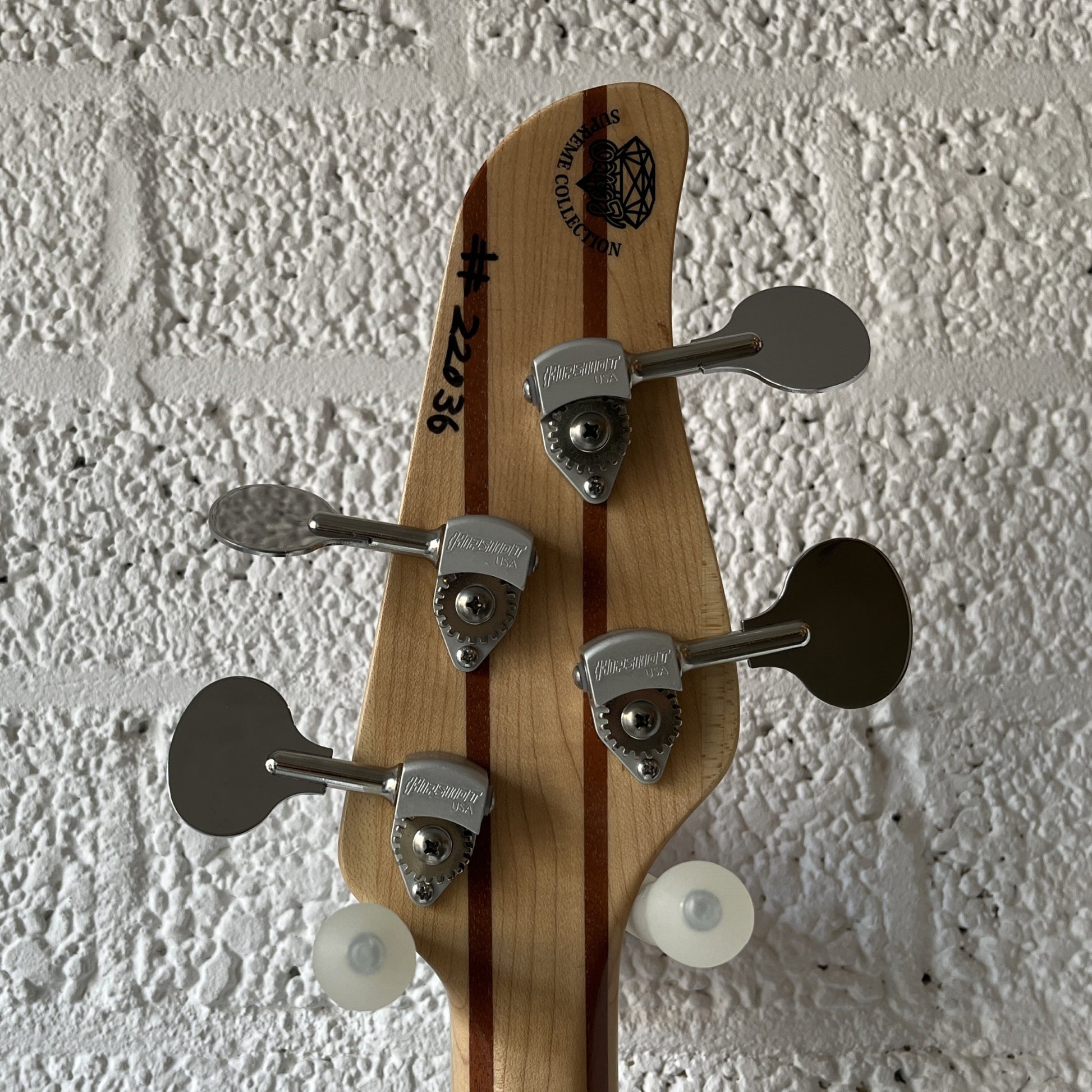 oopegg stormbreaker bass pearl pink headstock back view