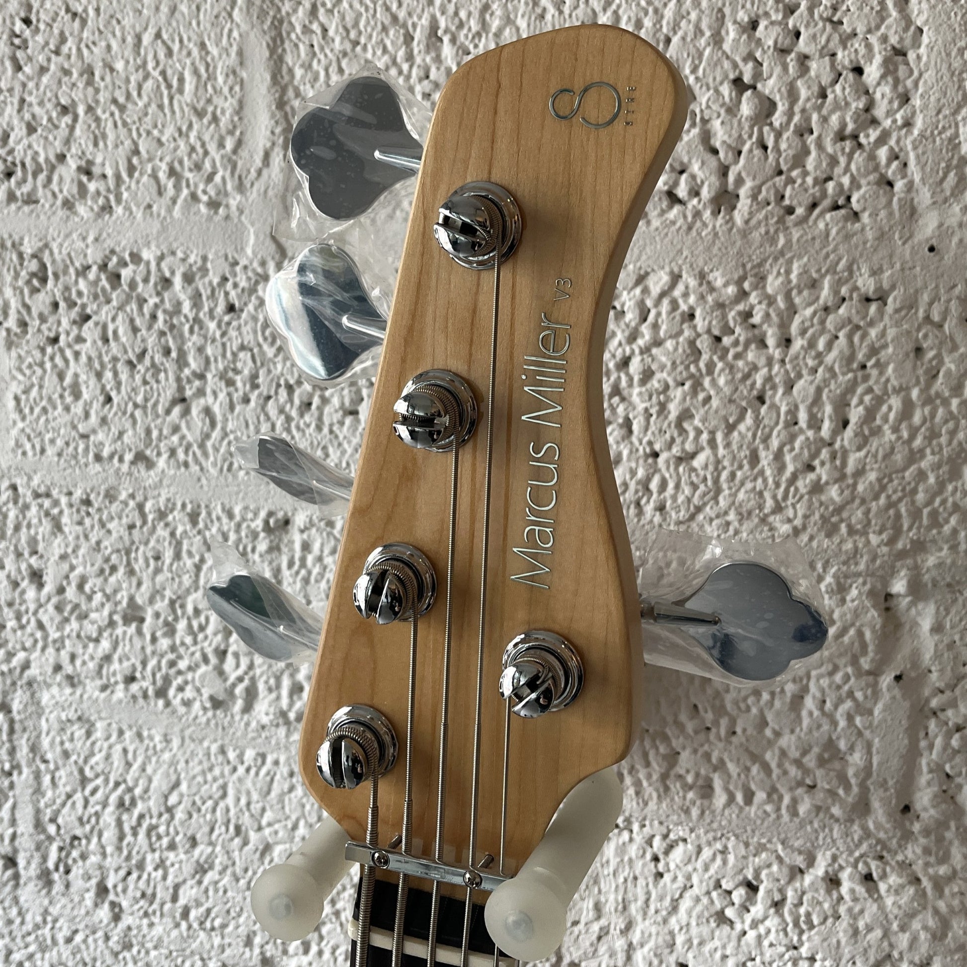 sire marcus miller v3+5 5-string mahogany electric bass headstock