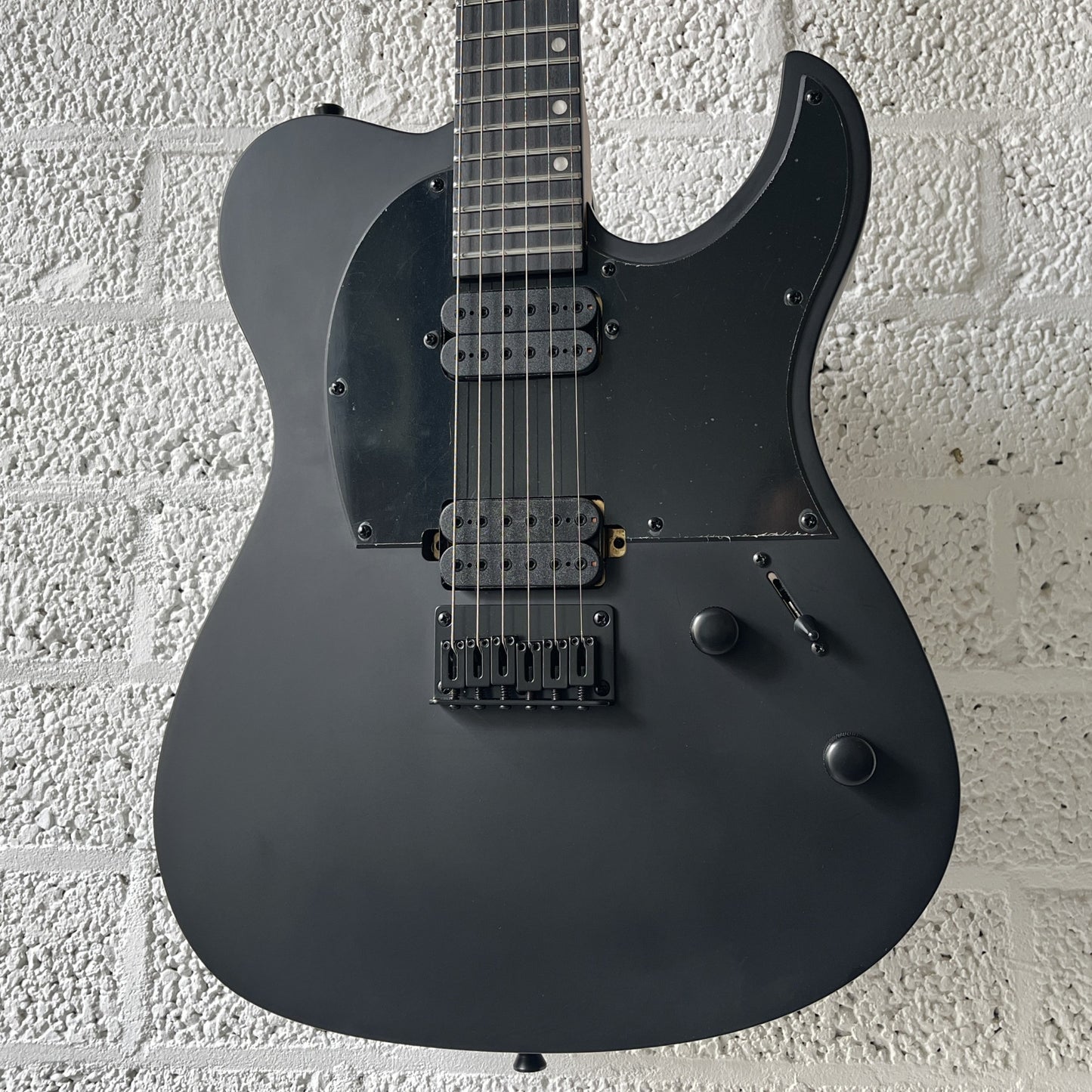 spira t-400 satin black electric guitar body closeup