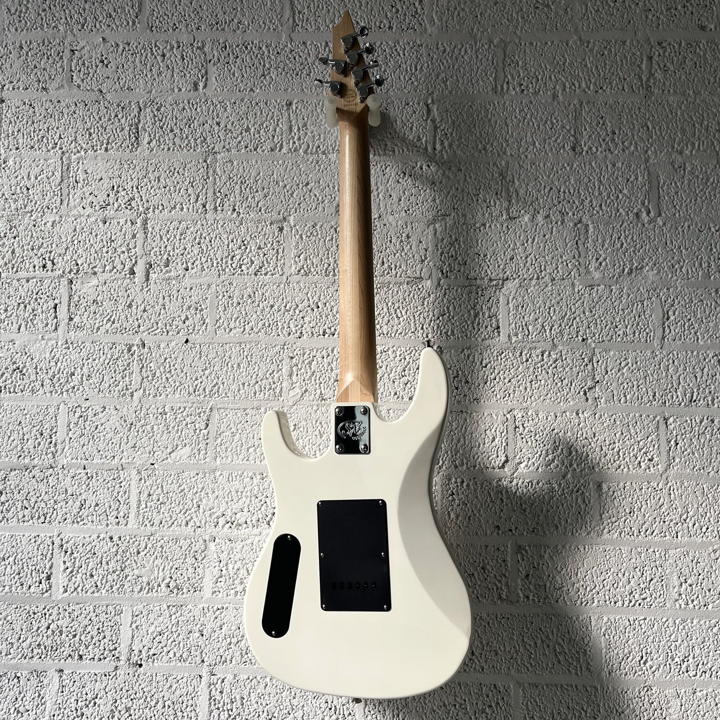 sx sst mini white electric guitar back view