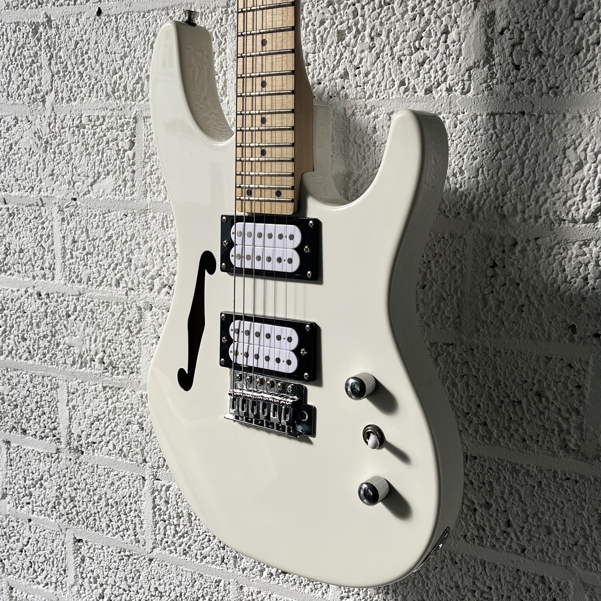 sx sst mini white electric guitar body angled