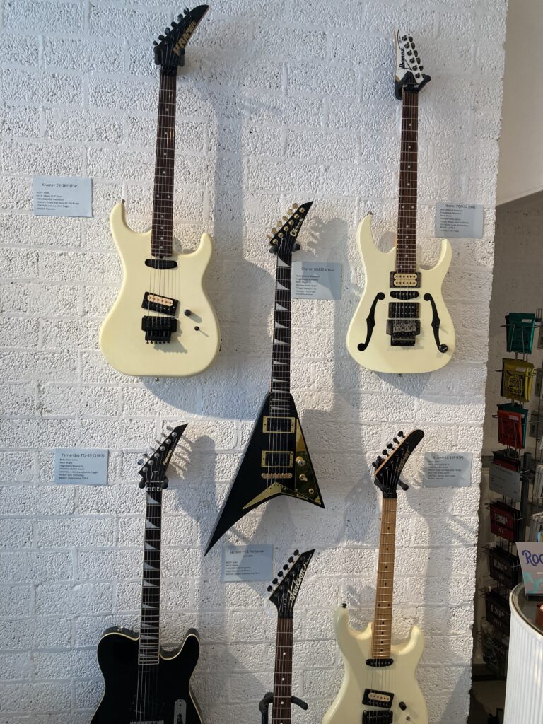 Wall of Metal Guitars